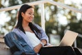 Portrait of a cheerful pretty asian female student Royalty Free Stock Photo