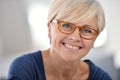 Portrait of cheerful senior woman wearing eyeglasses Royalty Free Stock Photo