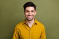 Portrait of cheerful successful young corporate man beaming smile isolated on khaki color background Royalty Free Stock Photo