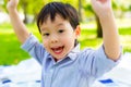 Portrait cheerful toddler or preschool boy. Lovely little boy feel happy and yelling that kid gets long weekend holiday. Cute