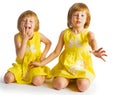 Portrait of cheerful twin sisters hugging and smiling at cam Royalty Free Stock Photo
