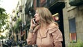 Portrait of cheerful woman talking smartphone. positive woman chatting cellphone Royalty Free Stock Photo