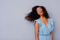 Cheerful young african american woman with curly hair laughing Royalty Free Stock Photo