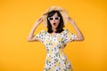 Portrait cheerful young asian woman happy smile dressing springtime female style fashion and sunglasses isolated on yellow Royalty Free Stock Photo