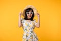 Portrait cheerful young asian woman happy smile dressing springtime female style fashion and sunglasses isolated on yellow Royalty Free Stock Photo