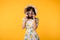 Portrait cheerful young asian woman happy smile dressing springtime female style fashion and sunglasses isolated on yellow Royalty Free Stock Photo