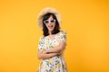 Portrait cheerful young asian woman happy smile dressing springtime female style fashion and sunglasses isolated on yellow Royalty Free Stock Photo