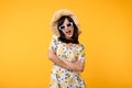 Portrait cheerful young asian woman happy smile dressing springtime female style fashion and sunglasses isolated on yellow Royalty Free Stock Photo