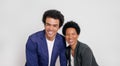 Portrait of cheerful young colleagues with afro hairstyle smiling at camera over white background Royalty Free Stock Photo