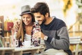 Portrait of a cheery attractive couple drinking coffee