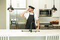 Portrait of chef cooker in kitchen. Chef with sign of perfect food. Chef with sign for delicious. Man cook making tasty Royalty Free Stock Photo