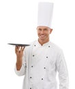 Portrait of chef, empty tray and smile, presenting menu special promo deal or restaurant product placement. Happy cafe