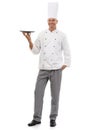 Portrait of chef holding empty tray, menu special and smile presenting promo deal or restaurant product placement. Happy Royalty Free Stock Photo