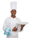Portrait, chef and plate in studio in hospitality career, happy server, waiter and professional in food industry Royalty Free Stock Photo