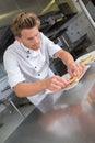 Portrait chef plating food