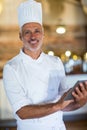 Portrait of chef using digital tablet Royalty Free Stock Photo