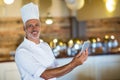 Portrait of chef using digital tablet Royalty Free Stock Photo