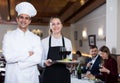 Portrait of chef and waitress Royalty Free Stock Photo