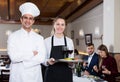 Portrait of chef and waitress Royalty Free Stock Photo