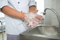 Portrait chef washing hands Royalty Free Stock Photo