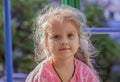 Child beautiful girl 4 years old with curly hair and huge brown eyes