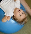 Portrait of a child with cerebral palsy on physiotherapy in a children therapy center. Boy with disability has therapy by doing Royalty Free Stock Photo