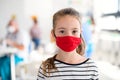 Portrait of child with face mask, coronavirus, covid-19 and vaccination concept. Royalty Free Stock Photo