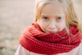 Portrait of a child girl with resentful expression and tears