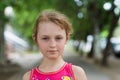 Portrait of child girl with a sly look