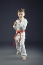 Portrait of a child with kimono practicing martial arts