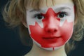 Child with a painted flag of Canada Royalty Free Stock Photo