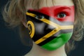 Portrait of a child with a painted Vanuatu flag