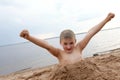 Portrait of child on sandy beach Royalty Free Stock Photo