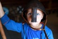 Child in Viking helmet