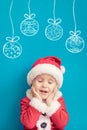 Portrait of child wearing Santa Claus costume Royalty Free Stock Photo