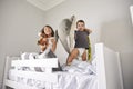 Portrait Of Children Playing With Toys In Bunk Bed