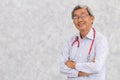 Portrait of Chinese doctor healthy old man Asian elder standing smile with space for text