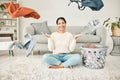 Portrait of a cleaning, carefree female cleaner throwing clothing in the air. Happy, smiling and young woman doing Royalty Free Stock Photo