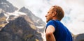 Portrait climber man looks on the mountain peaks Royalty Free Stock Photo