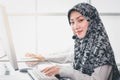 Portrait close up asian muslim woman receptionist with headset Royalty Free Stock Photo