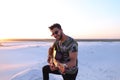 Portrait of close-up portrait of Arab guy who plays guitar strin Royalty Free Stock Photo