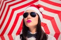 Portrait close up of a pretty young woman in Santa Claus hat Royalty Free Stock Photo