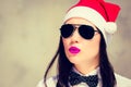 Portrait close up of a pretty young woman in Santa Claus hat Royalty Free Stock Photo