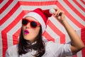 Portrait close up of a pretty young woman in Santa Claus hat Royalty Free Stock Photo