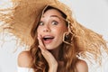 Portrait closeup of excited woman 20s wearing big straw hat look Royalty Free Stock Photo