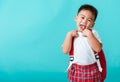 Portrait closeup happy Asian cute little child boy in uniform smiling Royalty Free Stock Photo