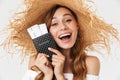 Portrait closeup of joyous young woman 20s wearing big straw hat Royalty Free Stock Photo