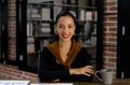 Portrait closeup shot of African American professional successful female businesswoman secretary in casual outfit standing smiling Royalty Free Stock Photo