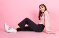 Portrait closeup studio shot of Asian young beautiful hipster female teenager model in casual long sleeve shirt street wears and Royalty Free Stock Photo