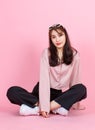 Portrait closeup studio shot of Asian young beautiful hipster female teenager model in casual long sleeve shirt street wears and Royalty Free Stock Photo